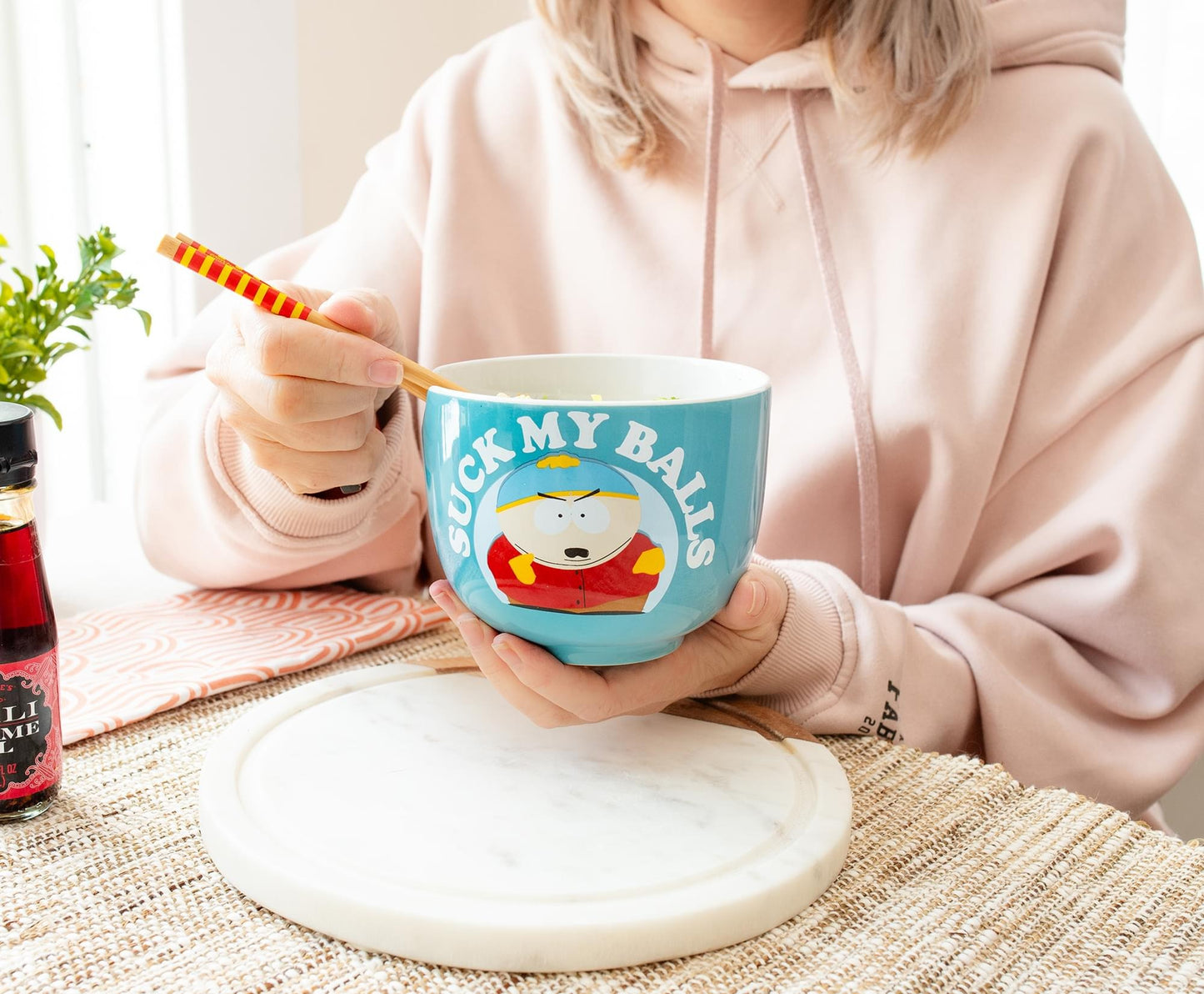 Close-up detail of the Eric Cartman graphic and text on the ceramic bowl