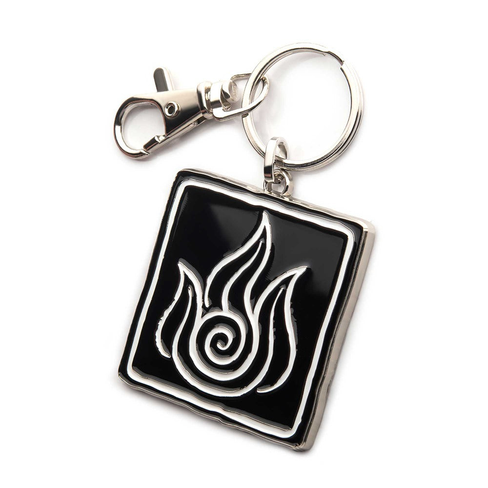 Close-up of the detailed Fire Nation emblem on the metal keychain.