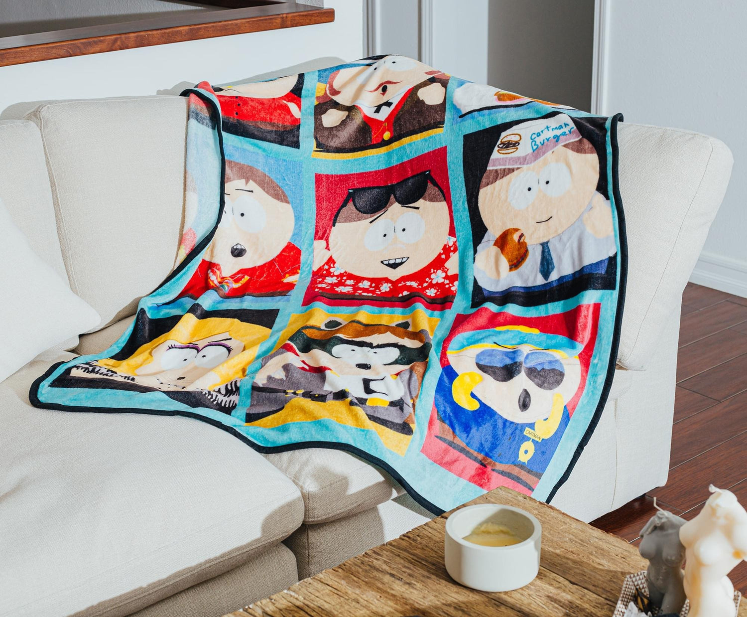 South Park raschel throw blanket shown in a cozy home setting