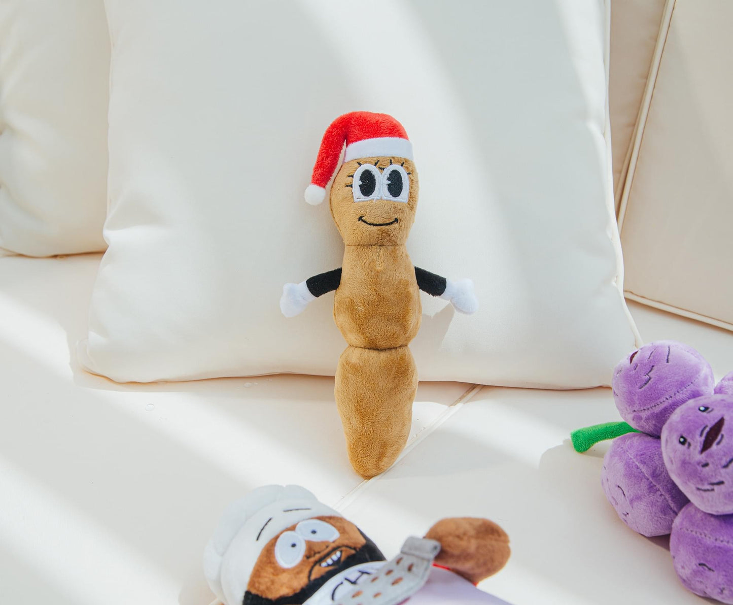 Lifestyle view of the 8-inch Mr. Hankey plush toy