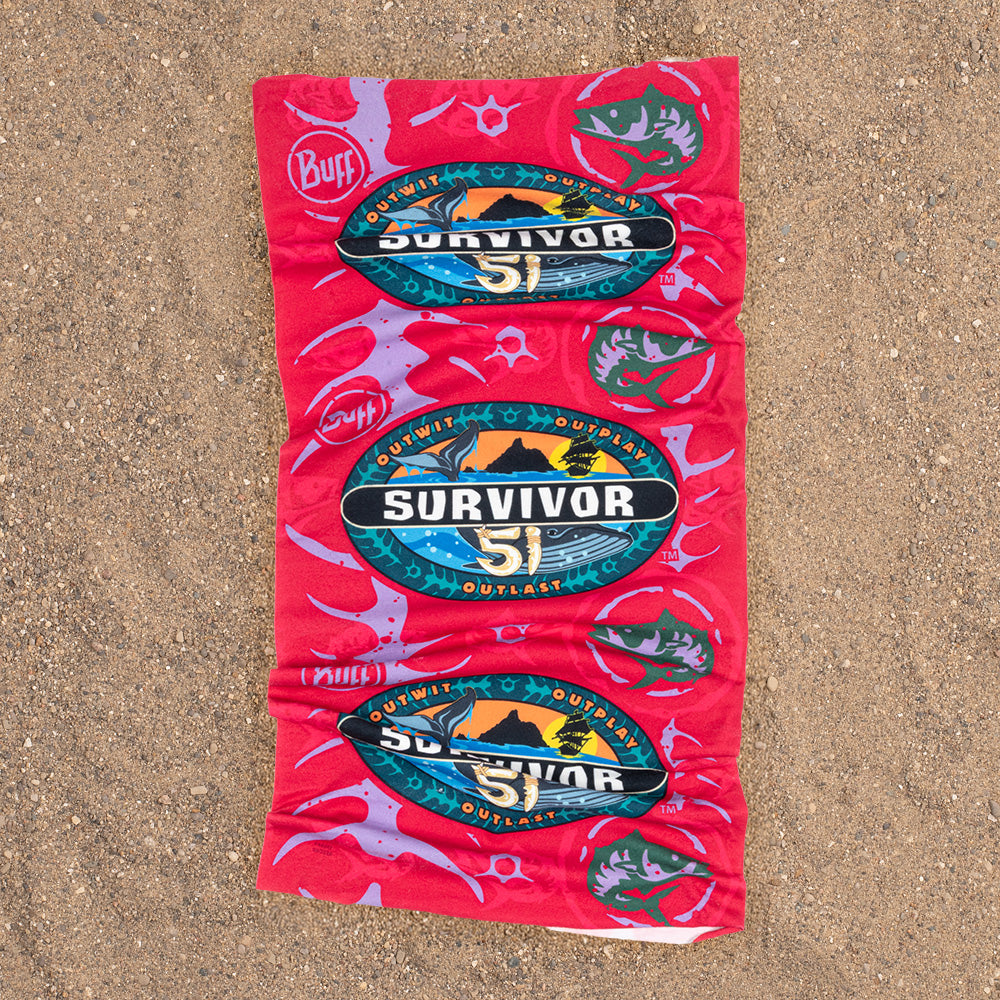 Close-up view of the magenta Dina tribe pattern and official Survivor branding on the BUFF headwear fabric
