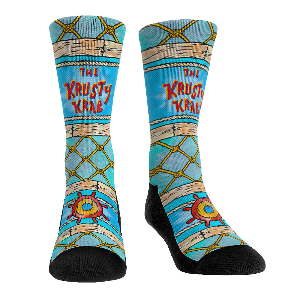 Vibrant crew socks featuring a pattern inspired by the Krusty Krab restaurant interior from SpongeBob SquarePants.
