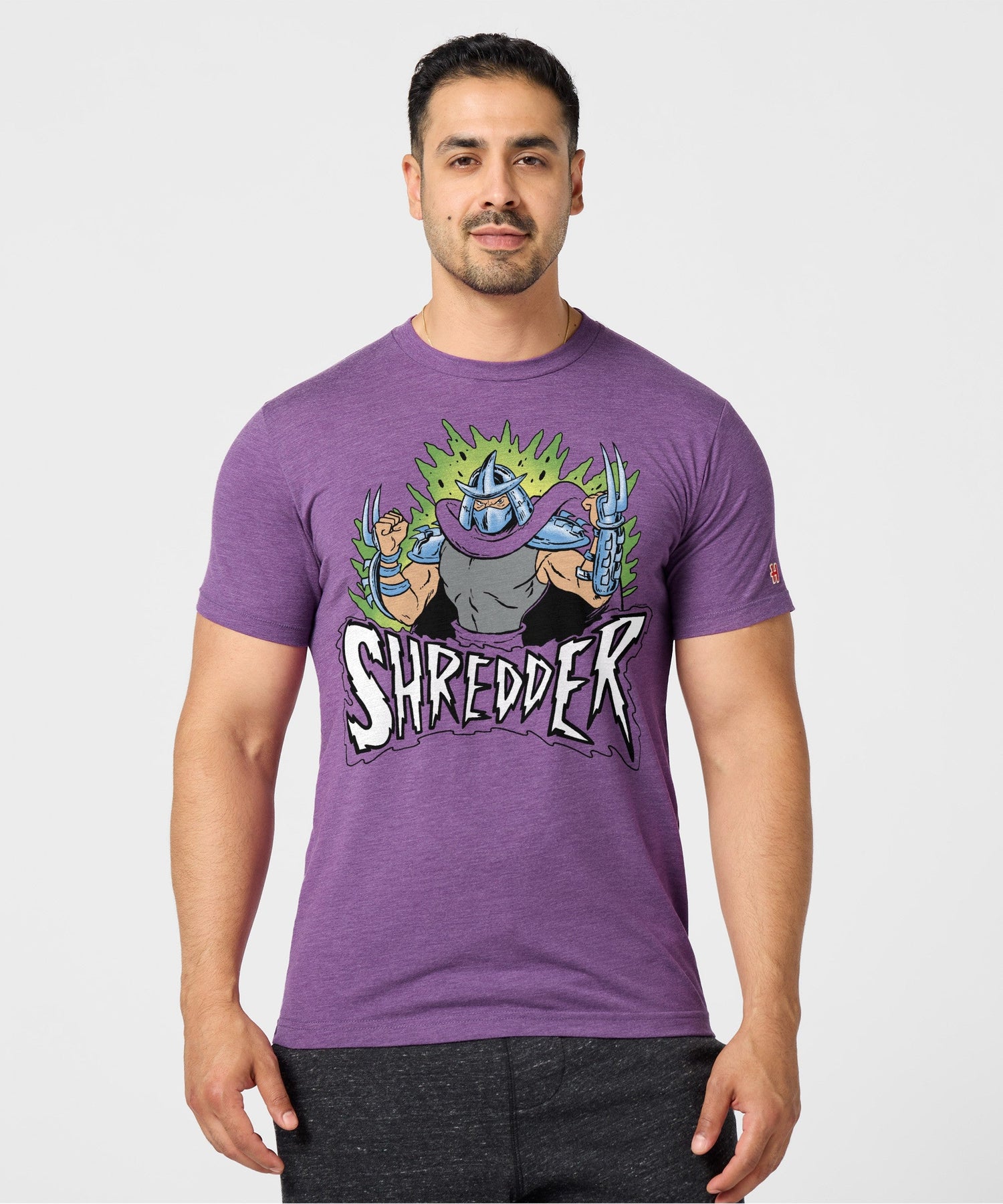 Side view of the royal purple t-shirt showing the standard short-sleeve fit and soft fabric drape