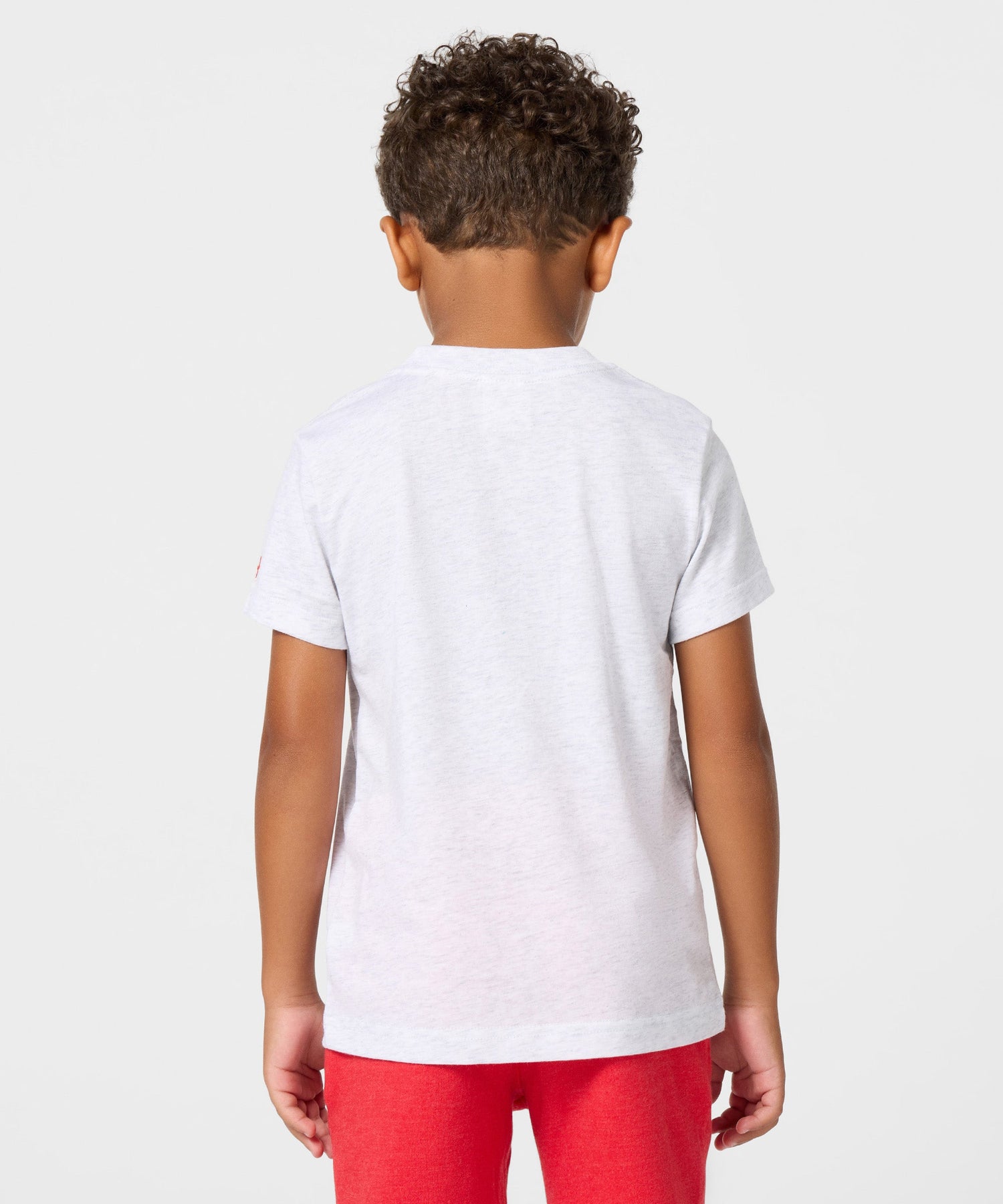 Detailed close-up of the fabric texture and collar construction on the youth t-shirt
