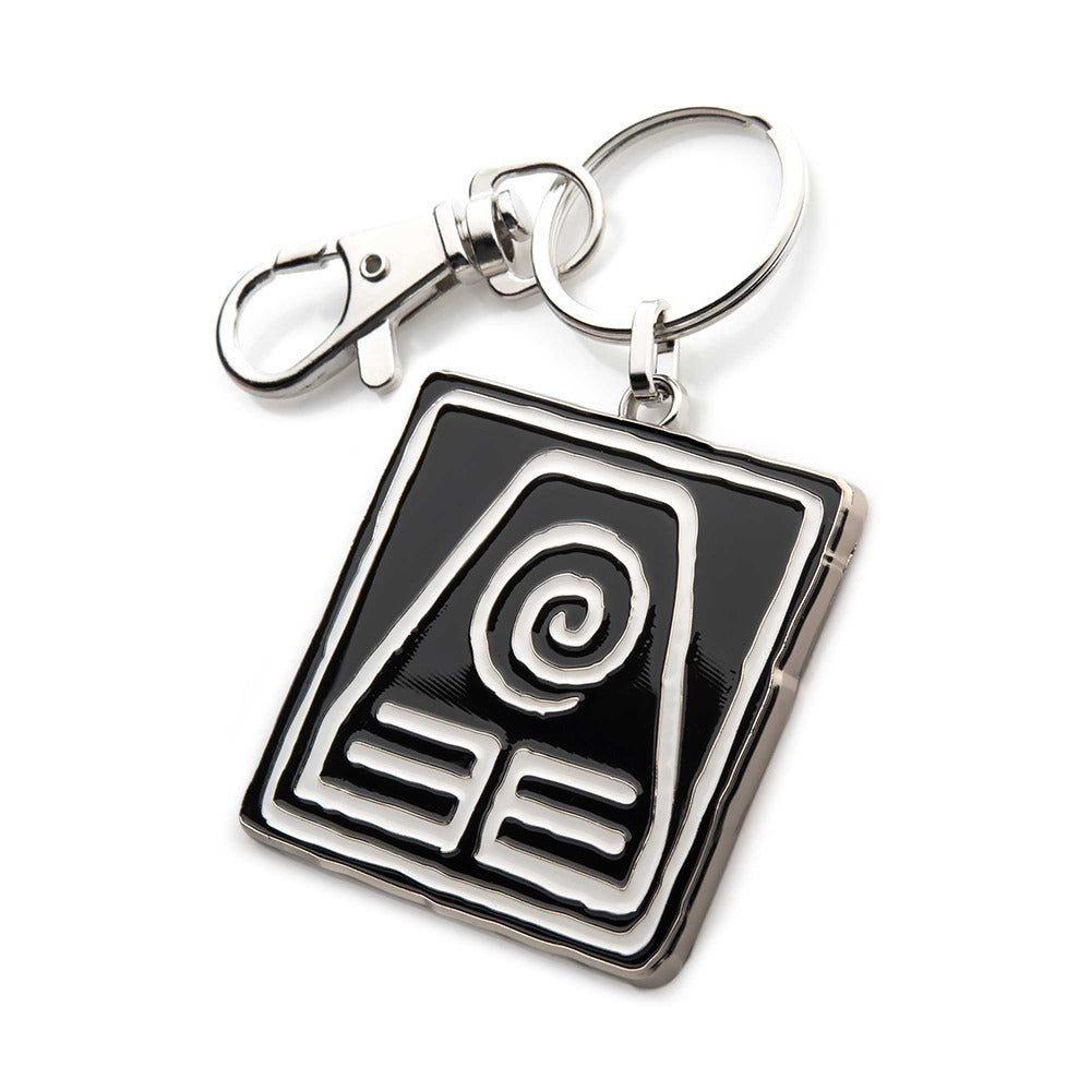 Close-up detail of the Earth Kingdom emblem featuring a square within a circle on a metal keychain.