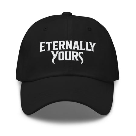 Front view of the Eternally Yours embroidered hat in cranberry, featuring the signature logo centered on the crown