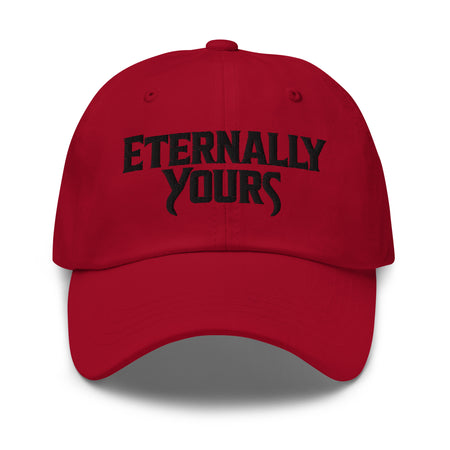 Front view of the Eternally Yours embroidered hat in crisp white with the contrast logo on the front panel