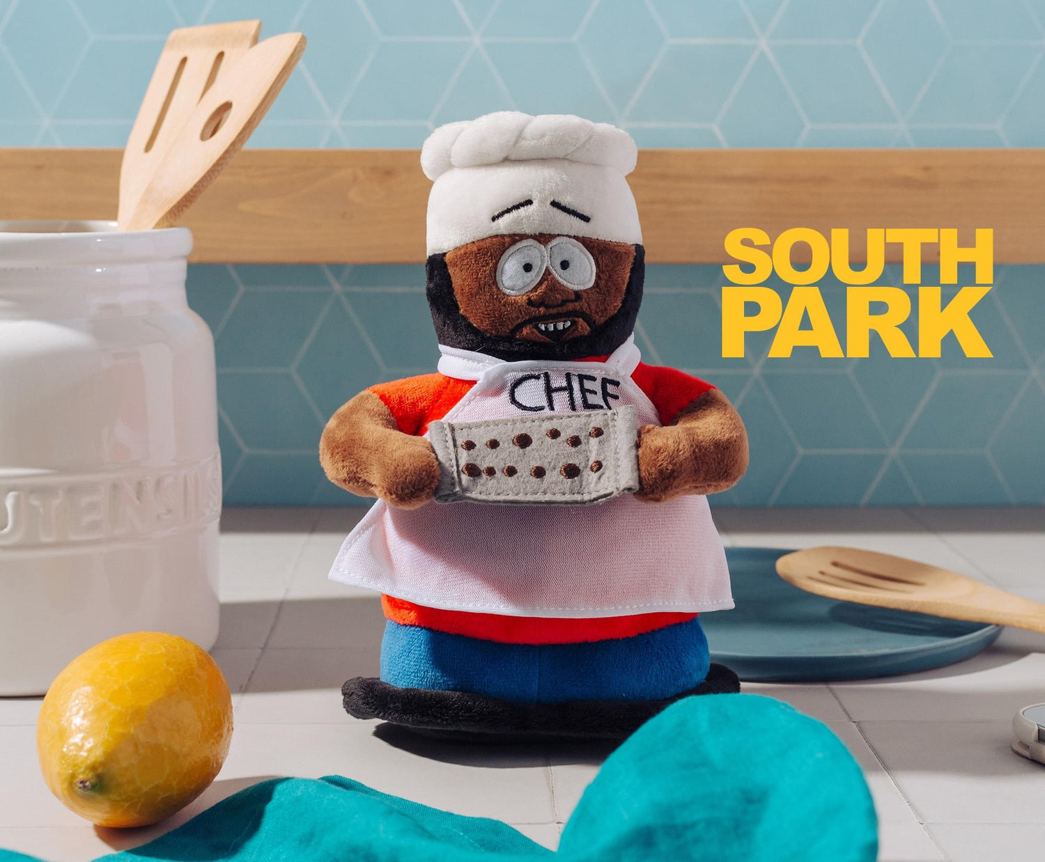 Side view of South Park Chef plush toy showing signature kitchen uniform