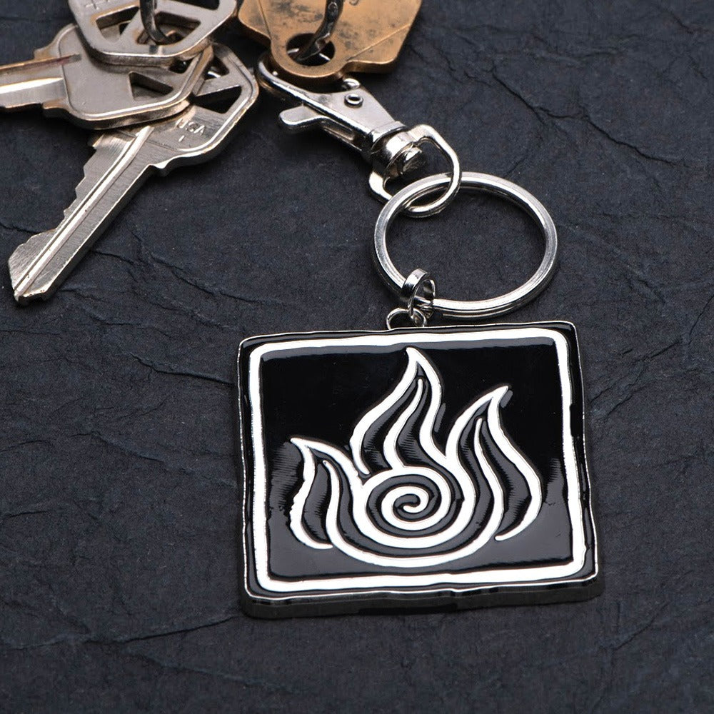 The Fire Nation keychain displayed with its official licensed jewelry packaging.