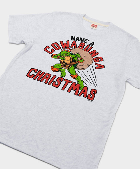 Close-up view of the Teenage Mutant Ninja Turtles holiday graphic print on the front of the t-shirt