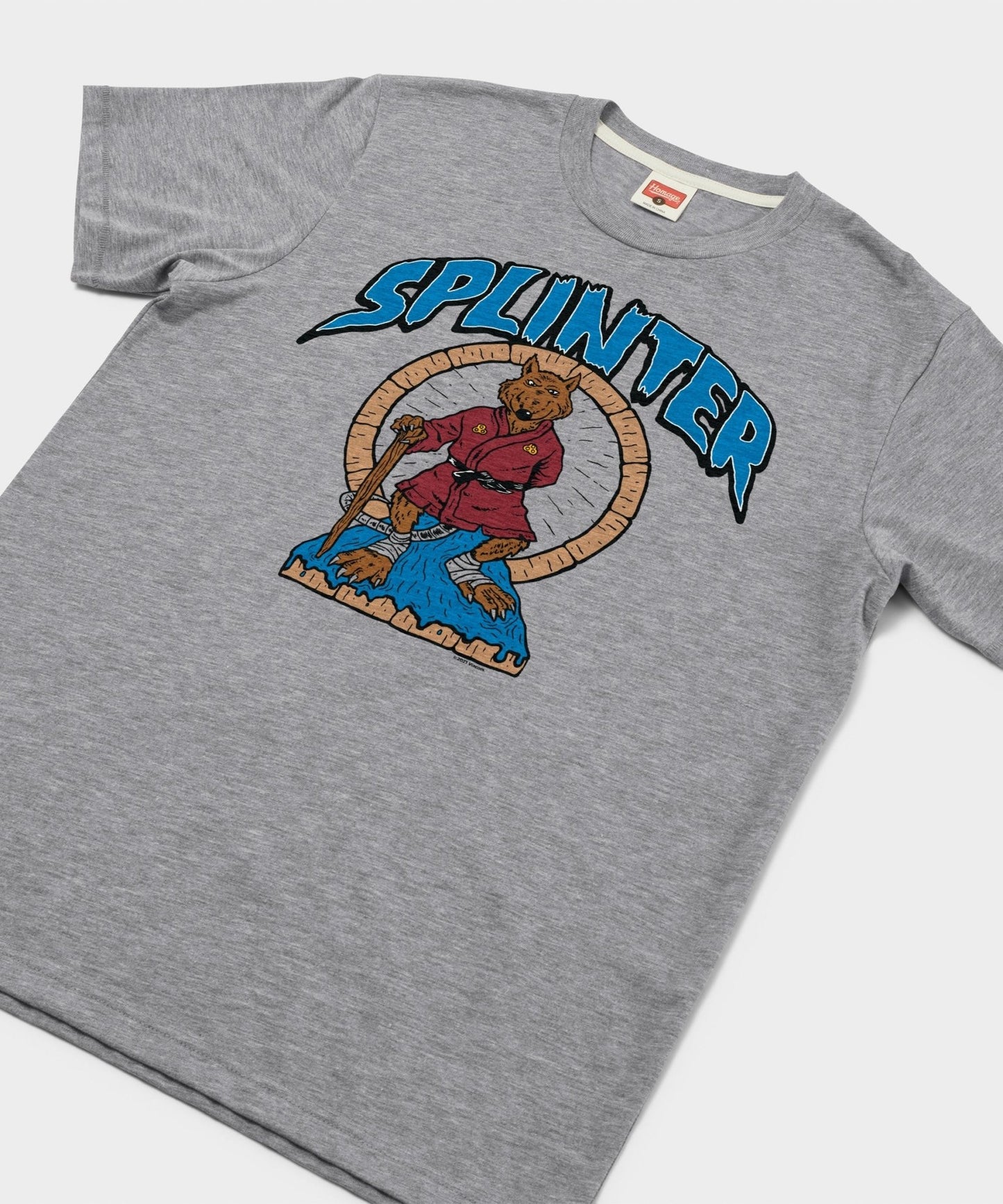 Close-up view of the Master Splinter character graphic printed on the front of the grey t-shirt