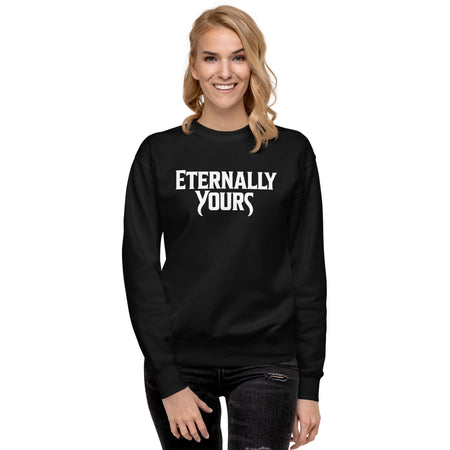 Close-up view of the Eternally Yours logo printed on the cotton-blend sweatshirt fabric