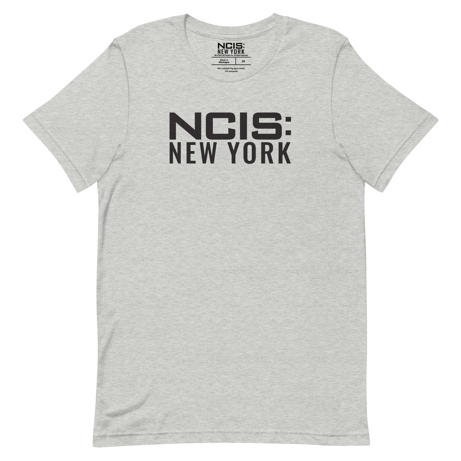 Close-up of the NCIS: New York text logo printed on the chest of the t-shirt