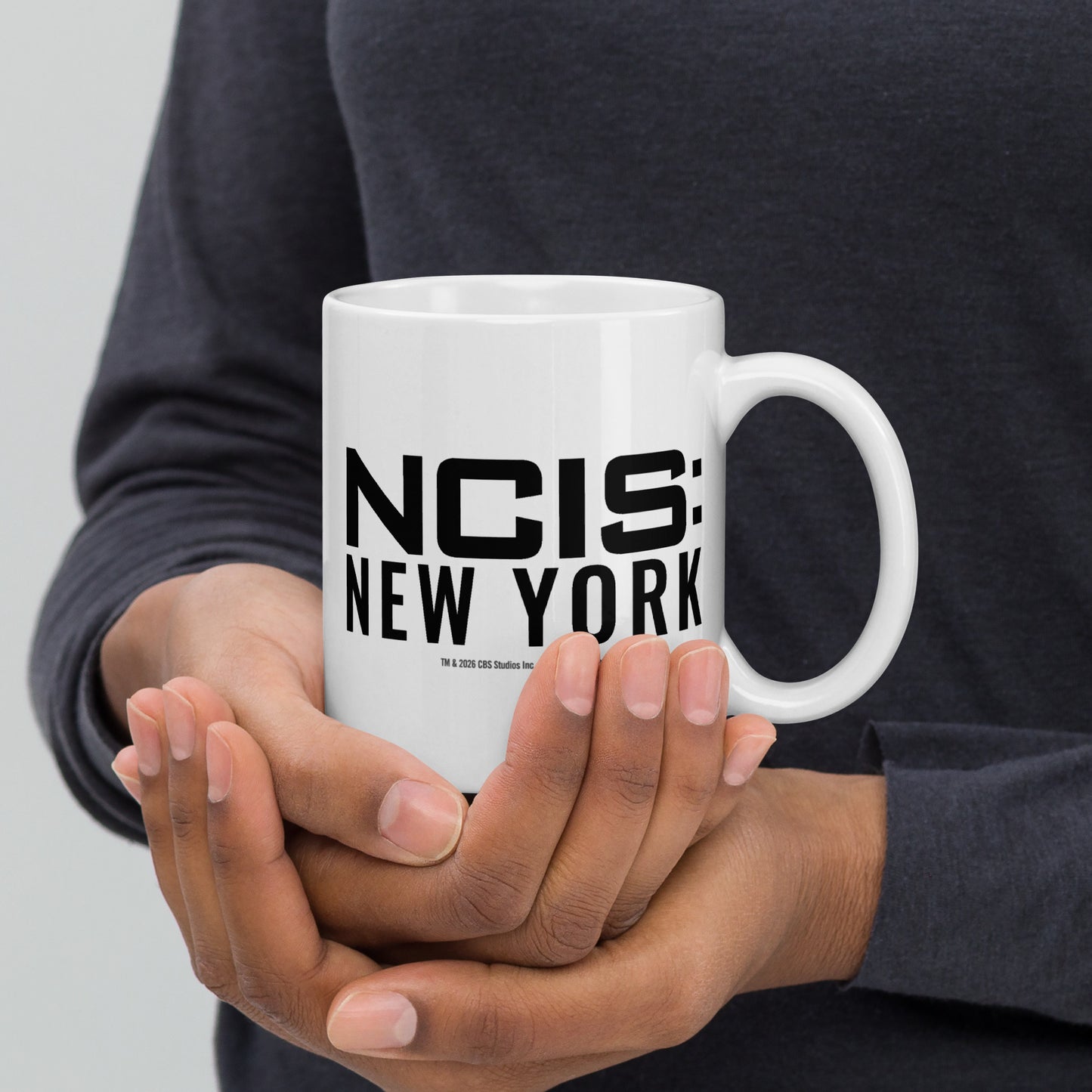Side view of the coffee mug with the handle facing left