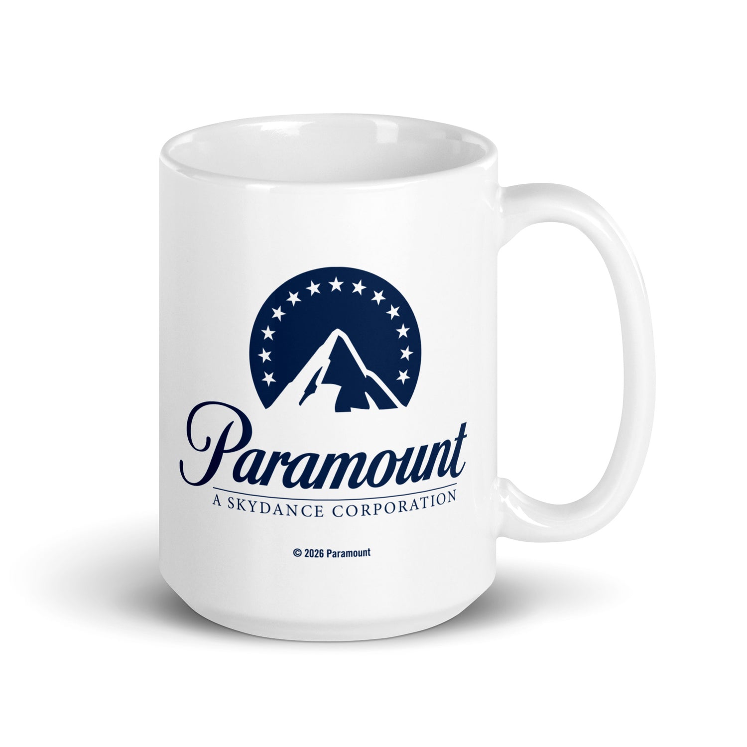 Person holding a Paramount Logo Mug with steaming coffee