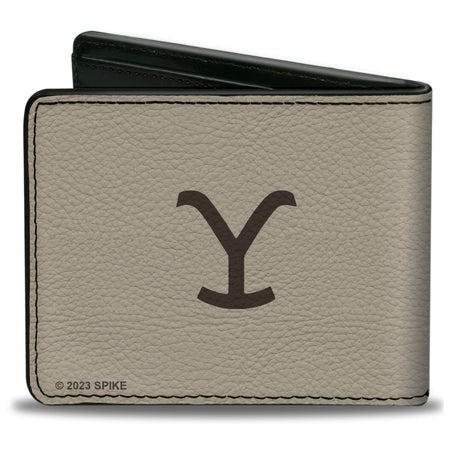Close-up of the vegan leather texture on the Yellowstone bi-fold wallet.
