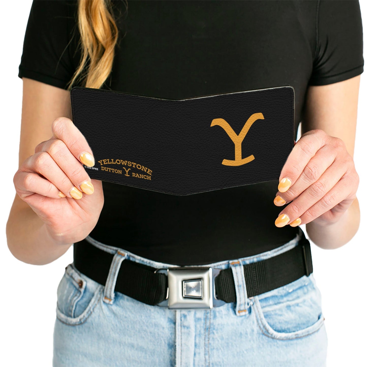 Yellowstone logo wallet held in hand showing scale and size