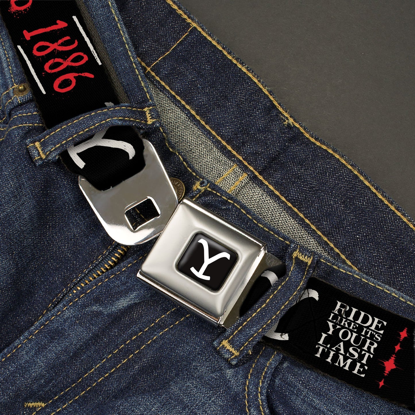 Close up of the authentic metal push-button buckle on Yellowstone belt.